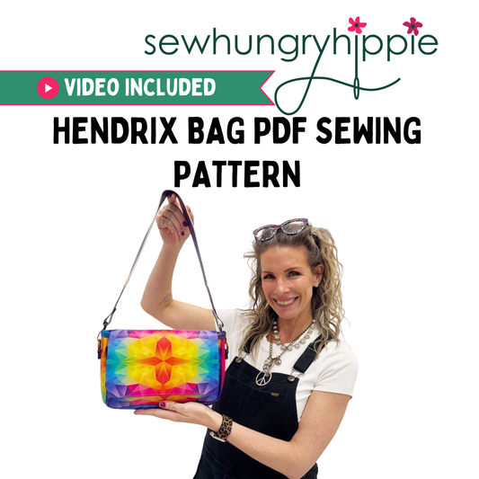 Sew Hungry Hippie Hendrix Bag PDF sewing pattern promotional graphic featuring a woman holding a handmade purse with a colorful rainbow geometric print and dark shoulder strap.