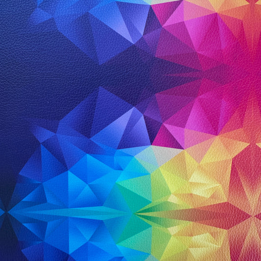 Geometric pattern with a rainbow of colors on a textured blue background