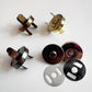 Metal components on a white background