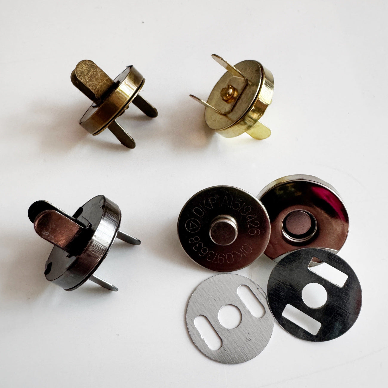 Metal components on a white background