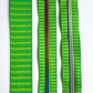A green and lime yellow striped bag making set featuring a jacquard woven webbing strap on the left, a continuous zipper tape with rainbow metallic coil teeth in the center, and a matching zipper tape with silver coil teeth on the right.