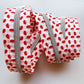 zipper coiled up with mushroom print on both sides