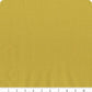 Mystic Fable Pistachio Mini Dot fabric features a vibrant greenish-yellow pistachio background patterned with tiny, subtle dots.