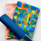 Navy blue faux leather paired with colorful abstract cotton fabric and coordinating blush pink textured cotton fabric, perfect for handbags, totes, wallets, pouches, and sewing projects.