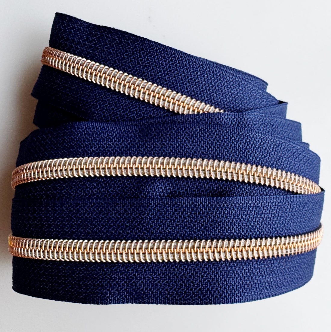 #5 Navy Continuous Zipper Tape with Rose Gold Teeth - 3 Yards