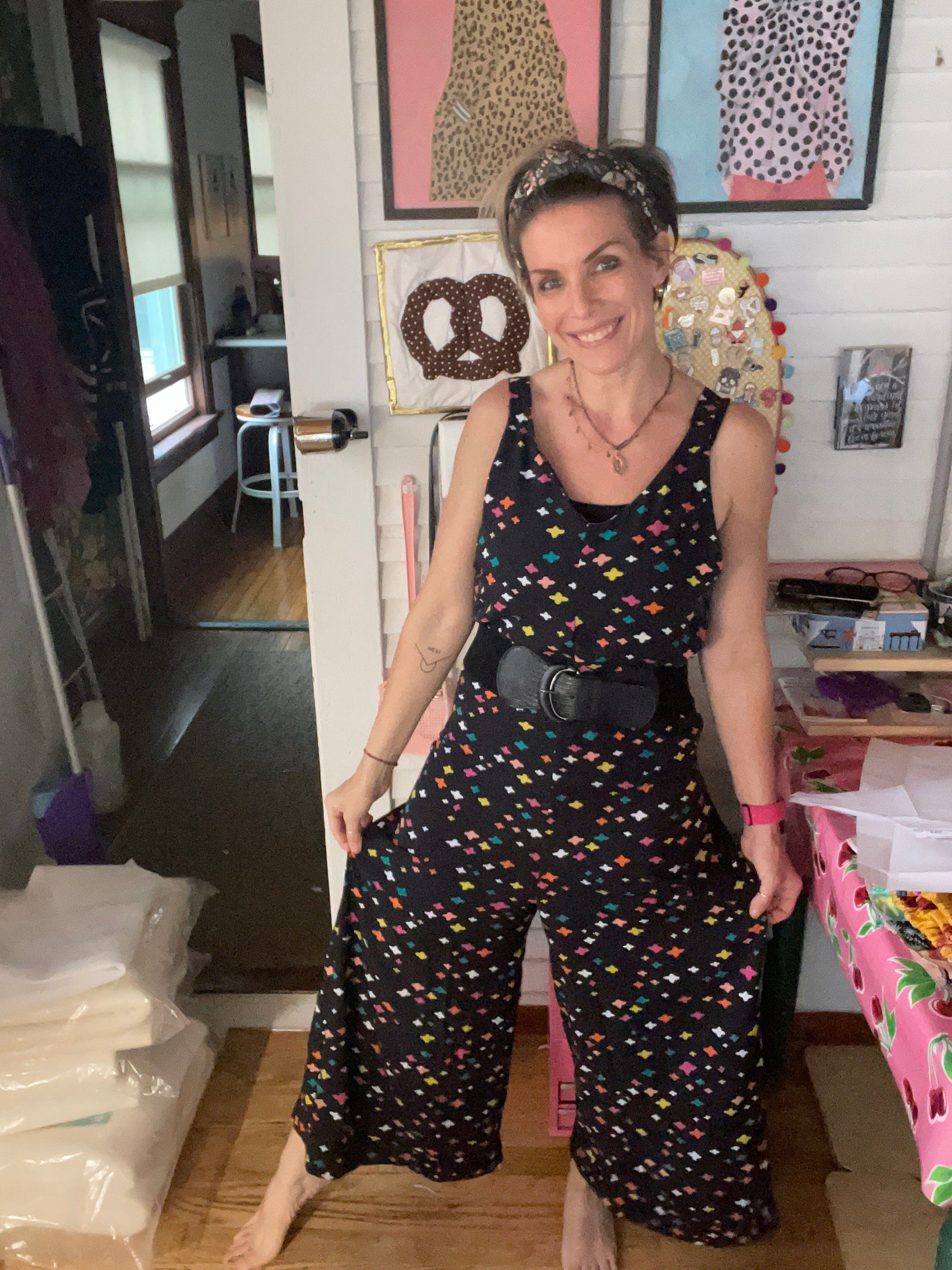 Natalie wearing a colorful Norman jumpsuit