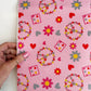 hand holding canvas fabric with peace and flowers