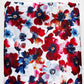 Floral fabric with red, blue, and white flowers on a white background