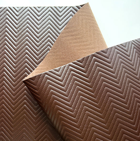 Brown textured vinyl with a geometric pattern on a white background
