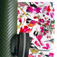 Floral and bird patterned product with a green textured background