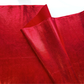 Red metallic vinyl bag-making material with shiny finish and textured backing on a white background
