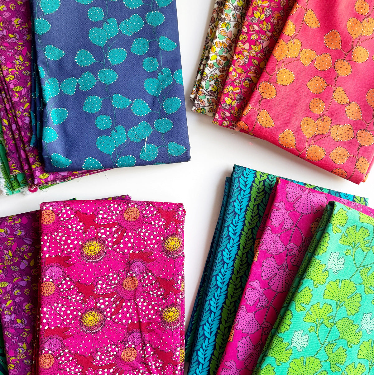 Collection of colorful patterned fabric swatches on a white background