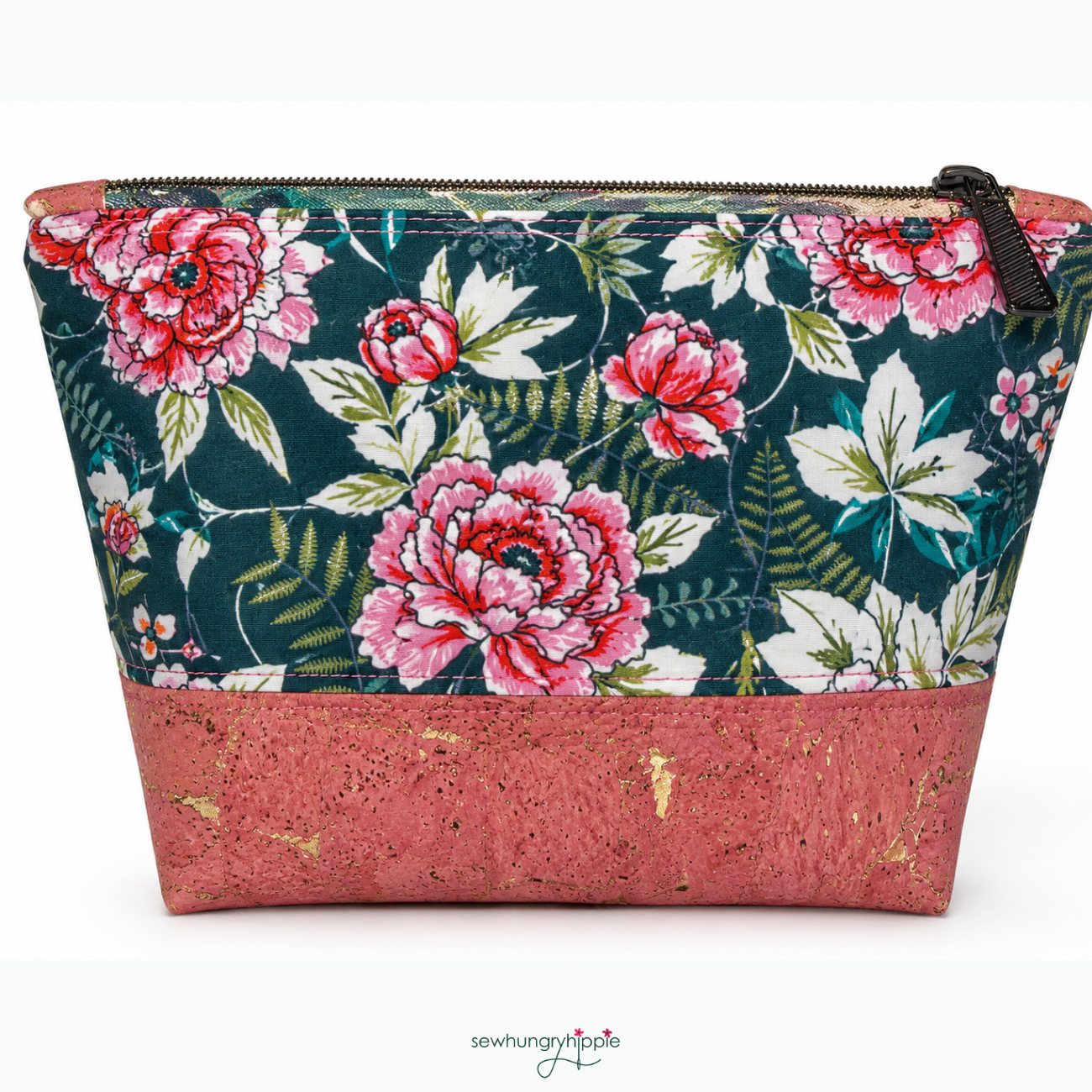Pink floral fabric on dark green background paired with a pink and gold flecked cork fabric roll for sewing and bag making.