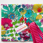 Sew Hungry Hippie floral fabric with pink ribbed webbing and dark pink metal swivel hooks for bag making