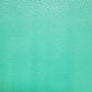 A close-up of a mint green pebbled leather texture filling the entire frame.