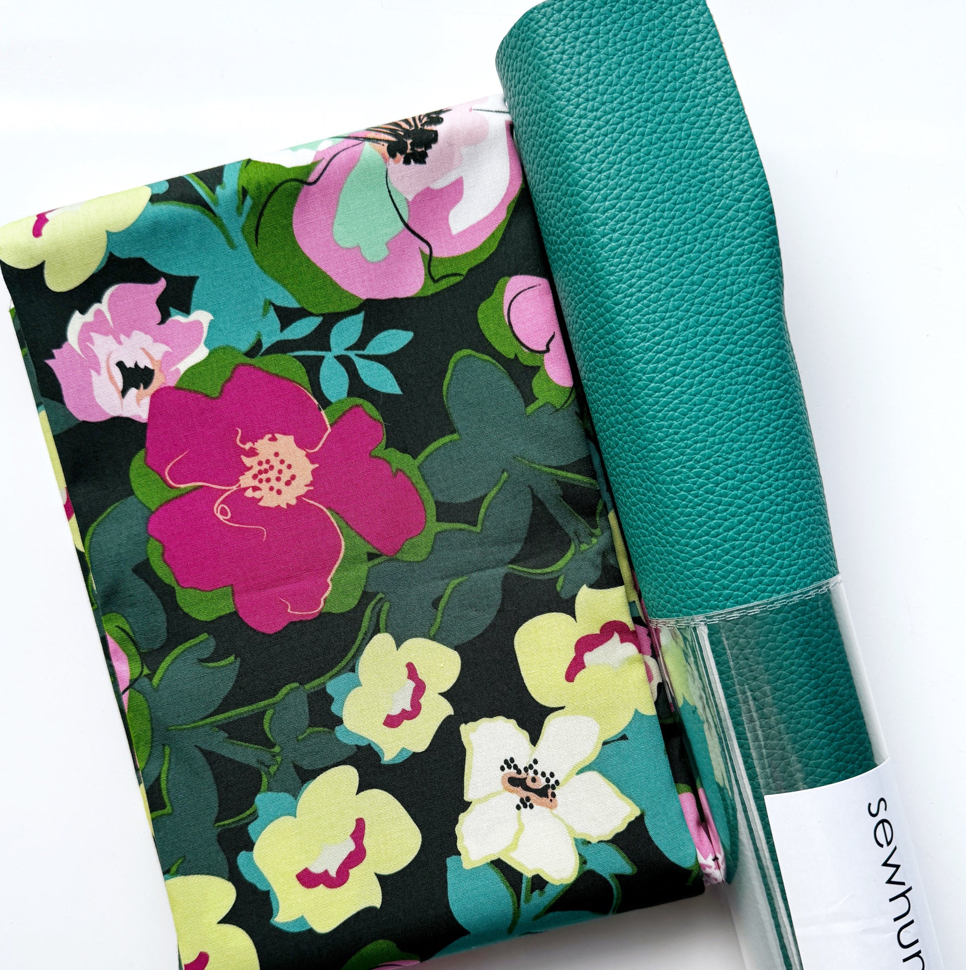 Colorful floral bonded nylon fabric with teal textured faux leather from Sew Hungry Hippie