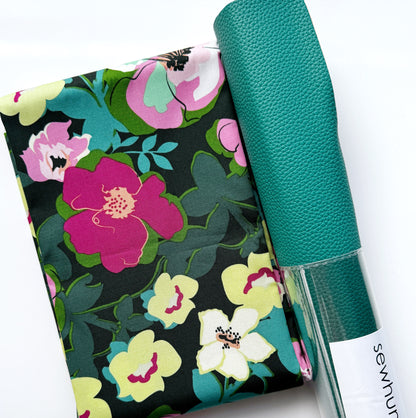 Colorful floral bonded nylon fabric with teal textured faux leather from Sew Hungry Hippie