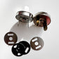 Metal components on a white background