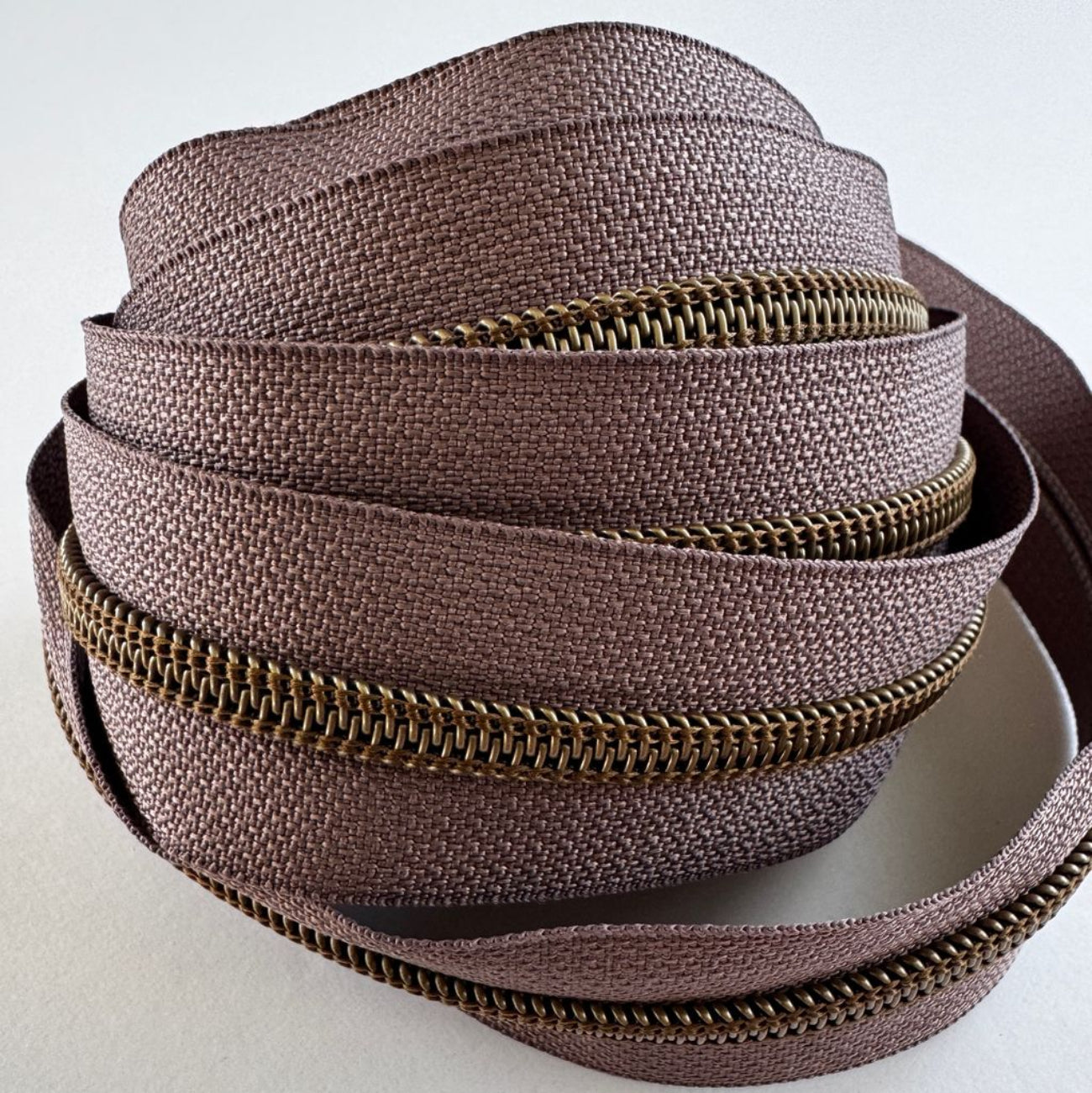 #5 continuous strawberry mocha zipper tape by the yard with bronze teeth for handmade bags and purses.