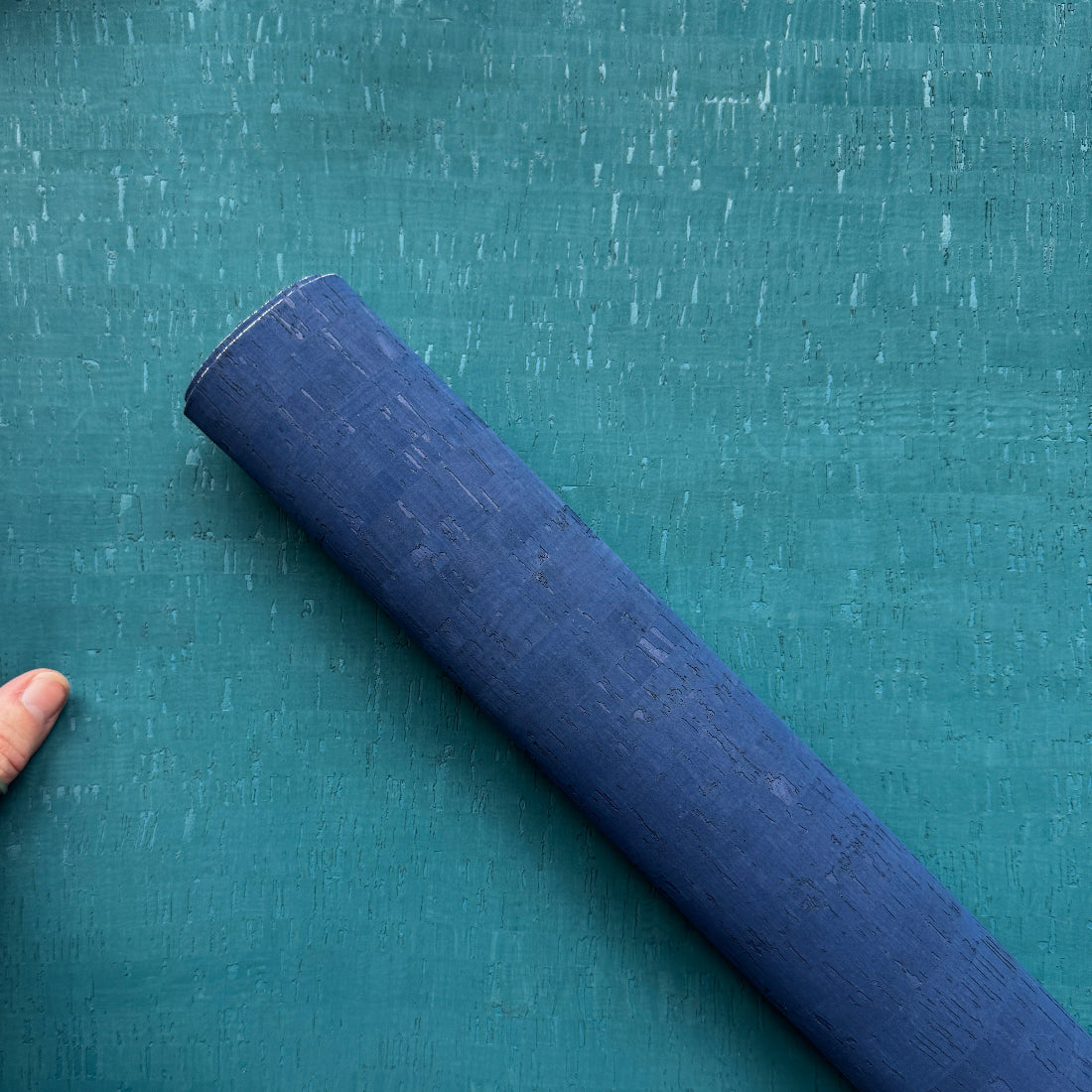 Teal cork fabric compared to royal blue cork fabric