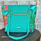 Teal quilted Moonglow vinyl tote with tropical print side panels, made by Shannon C.