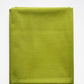 Folded green fabric on a white background