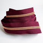 3-yard cut of #5 wine red continuous nylon zipper tape with rose gold teeth for handbags, purses, wallets, pouches, and bag making sewing projects.