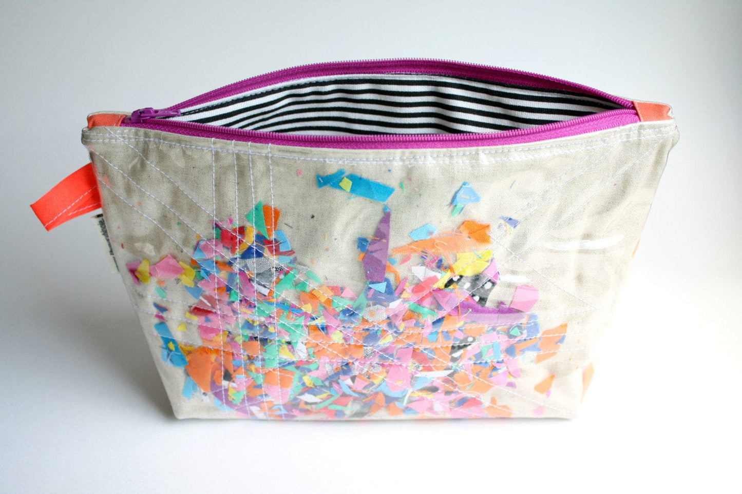 Colorful cosmetic bag with striped lining