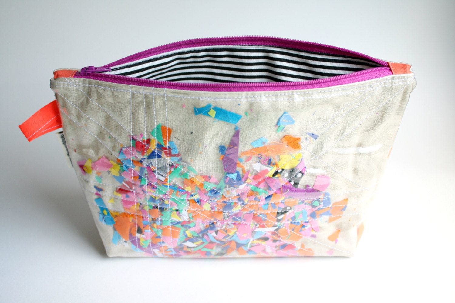 Colorful cosmetic bag with striped lining