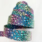 Roll of colorful leopard print ribbon.