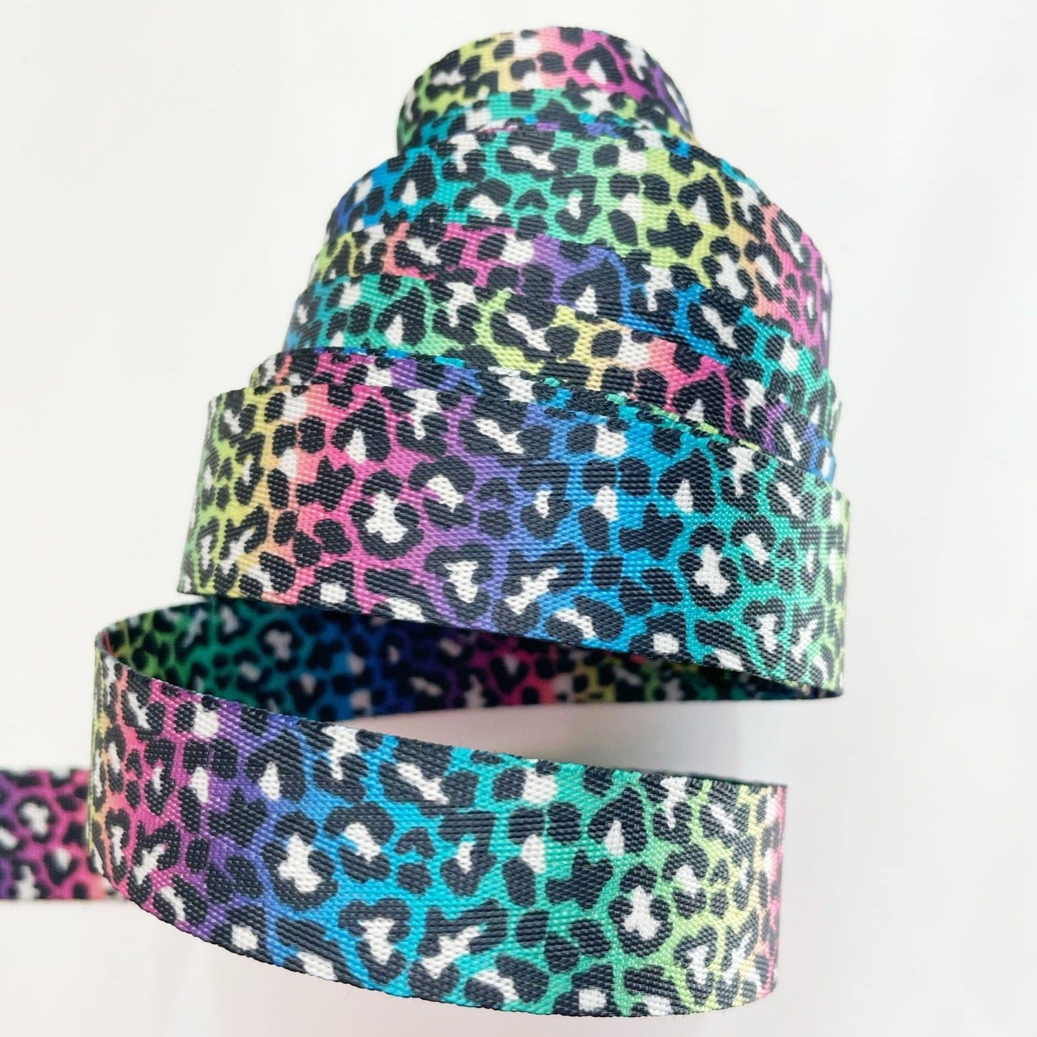 Roll of colorful leopard print ribbon.