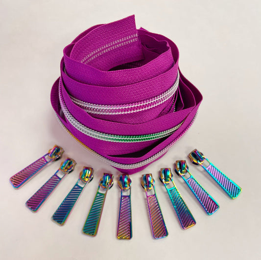 Fuchsia #5 continuous zipper tape with silver zipper teeth and iridescent rainbow zipper pulls, ideal for handbags, wallets, backpacks, pouches, and sewing projects.