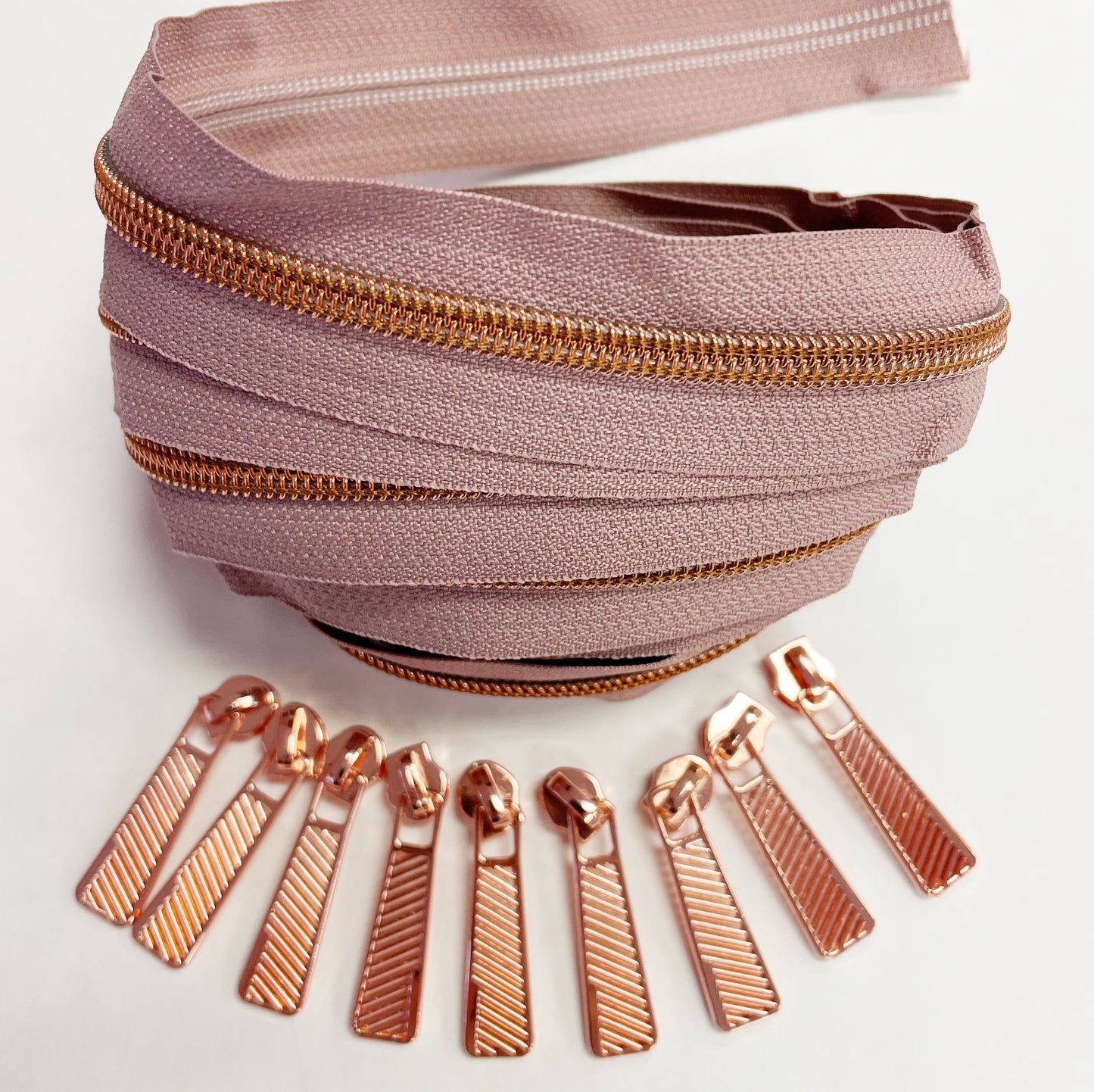 Dusty Rose and Rose Gold zipper pack