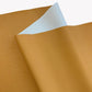Moonglow Mustard pebbled vinyl faux leather fabric with soft light backing