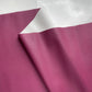 Pomegranate magenta pebbled faux leather vinyl fabric with smooth white knit backing