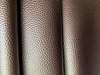 Close-up of textured brown leather folds.