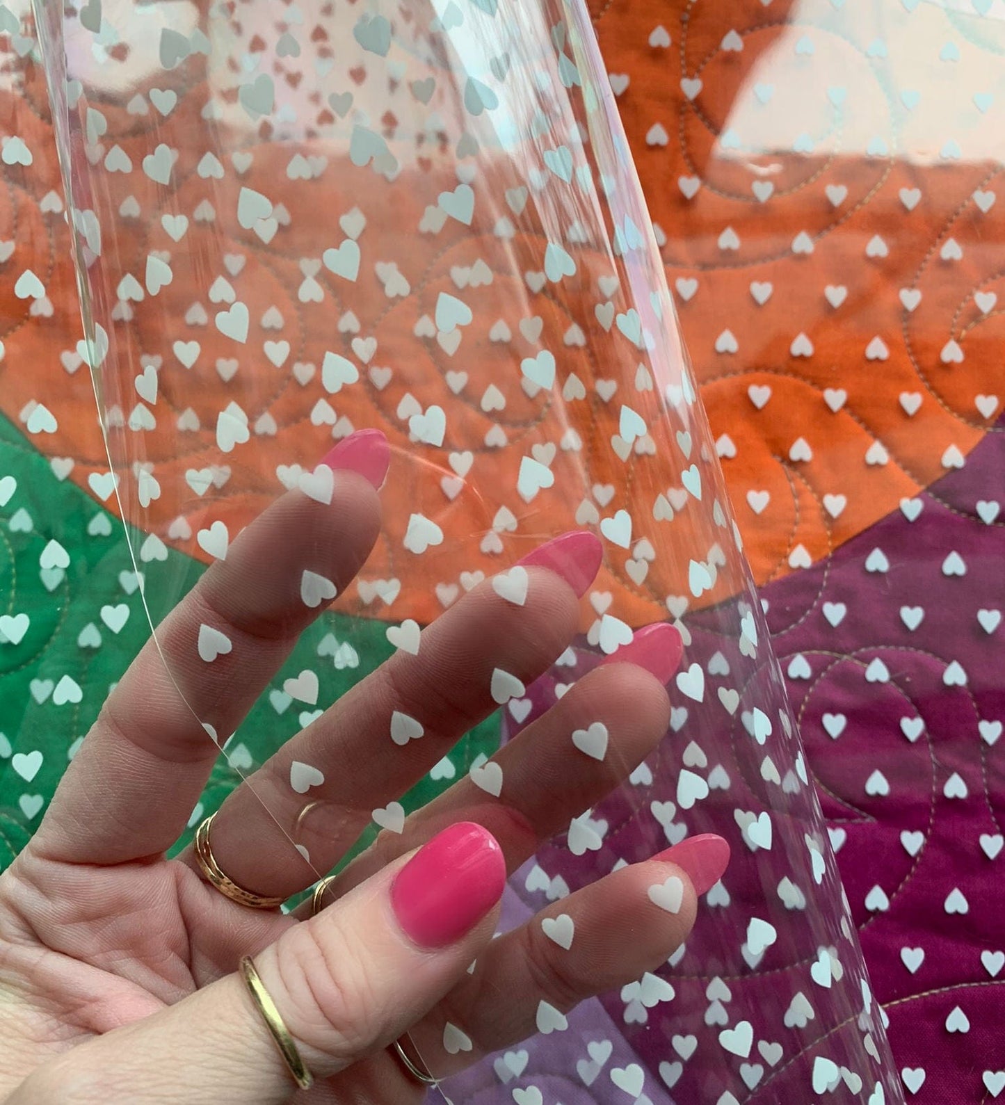 White vinyl heart sheet held up