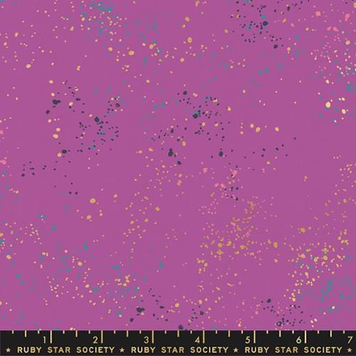 Witchy purple fabric with gold and blue speckles